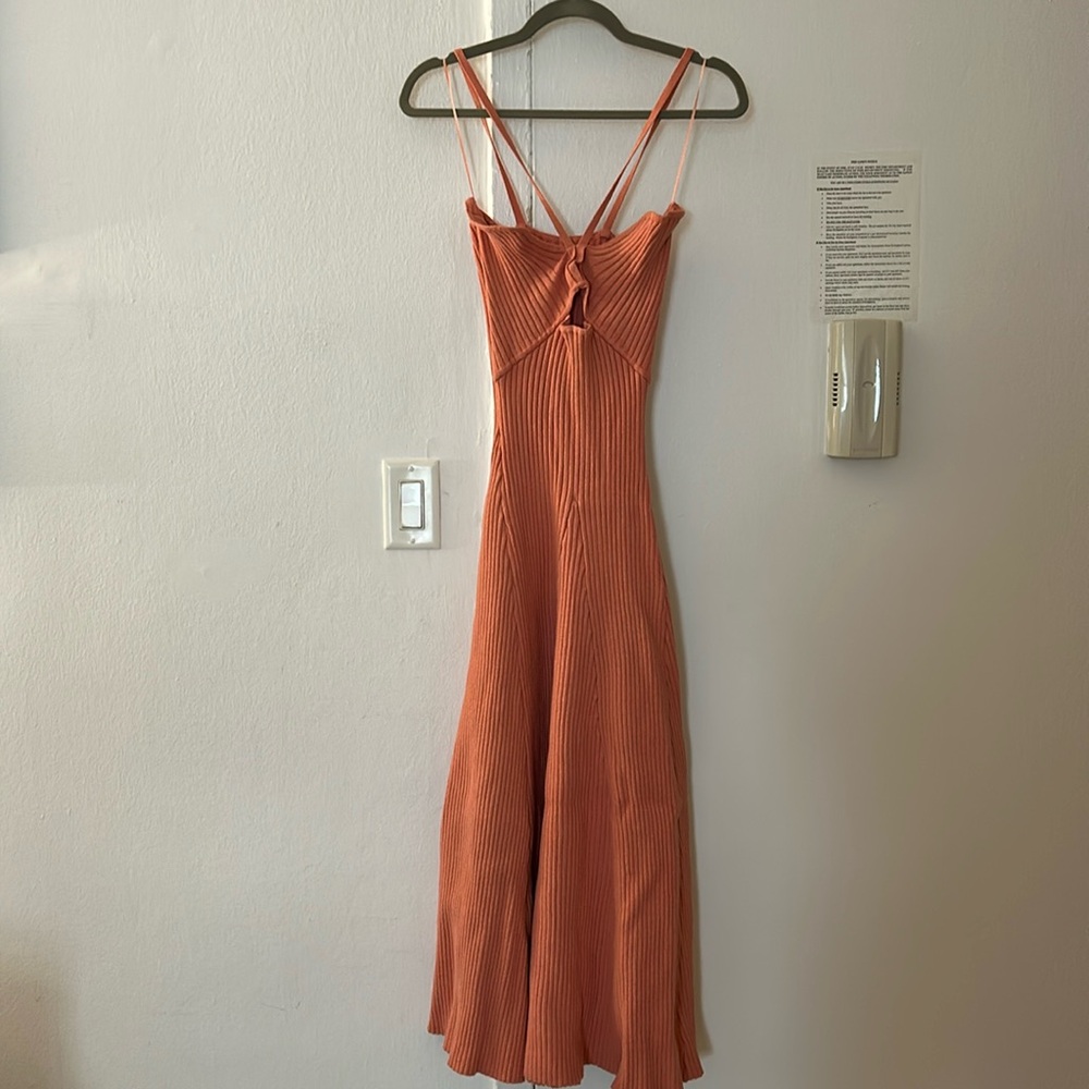 Orange ribbed knit strappy midi dress with cut out at top